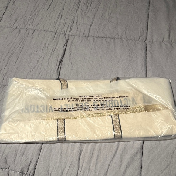 Victoria's Secret Beige Tote with Gold Accents - Picture 2 of 3